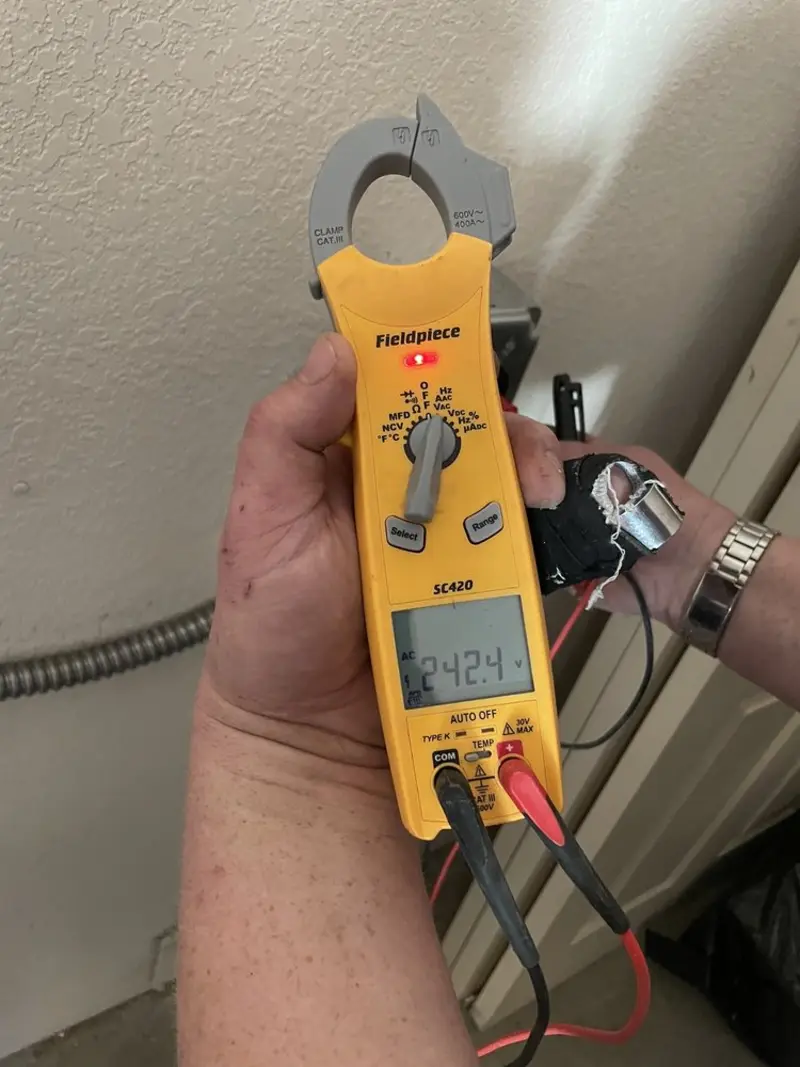 Voltage testing with clamp meter during Generator Installation in Clarence